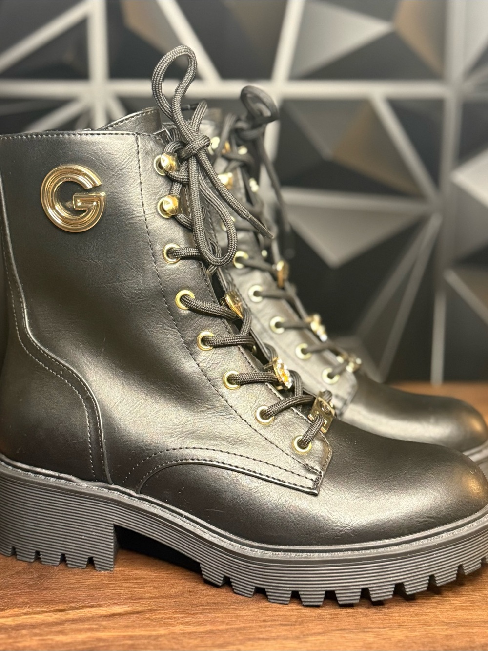 Guess Black Leather Combat Booties with Gold Accents